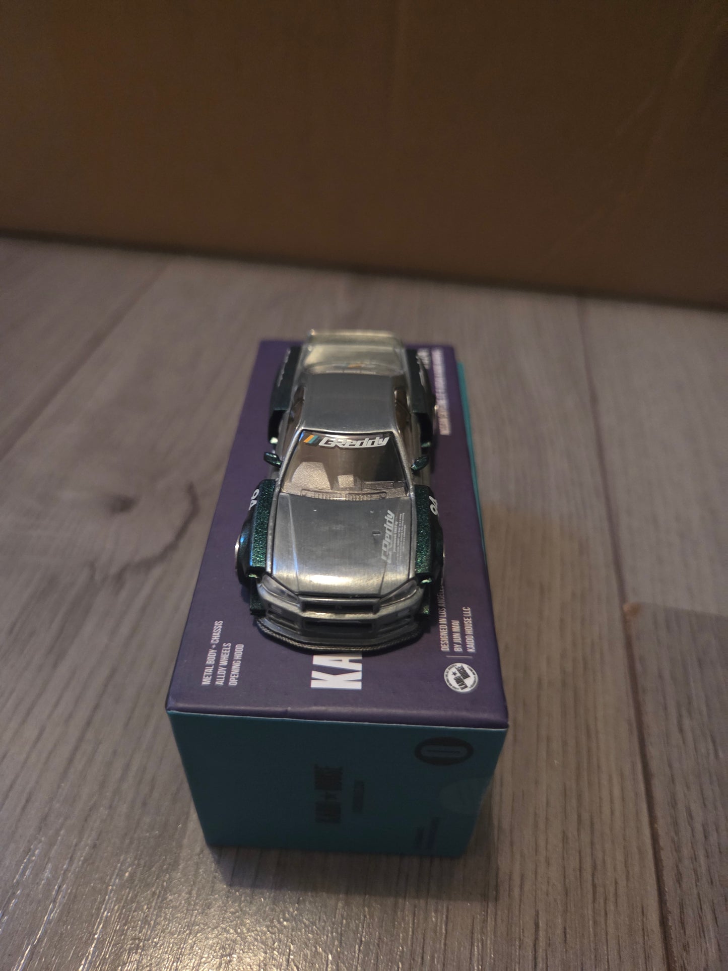 Kaido house x mini gt nissan skyline gtr r34 greddy chase