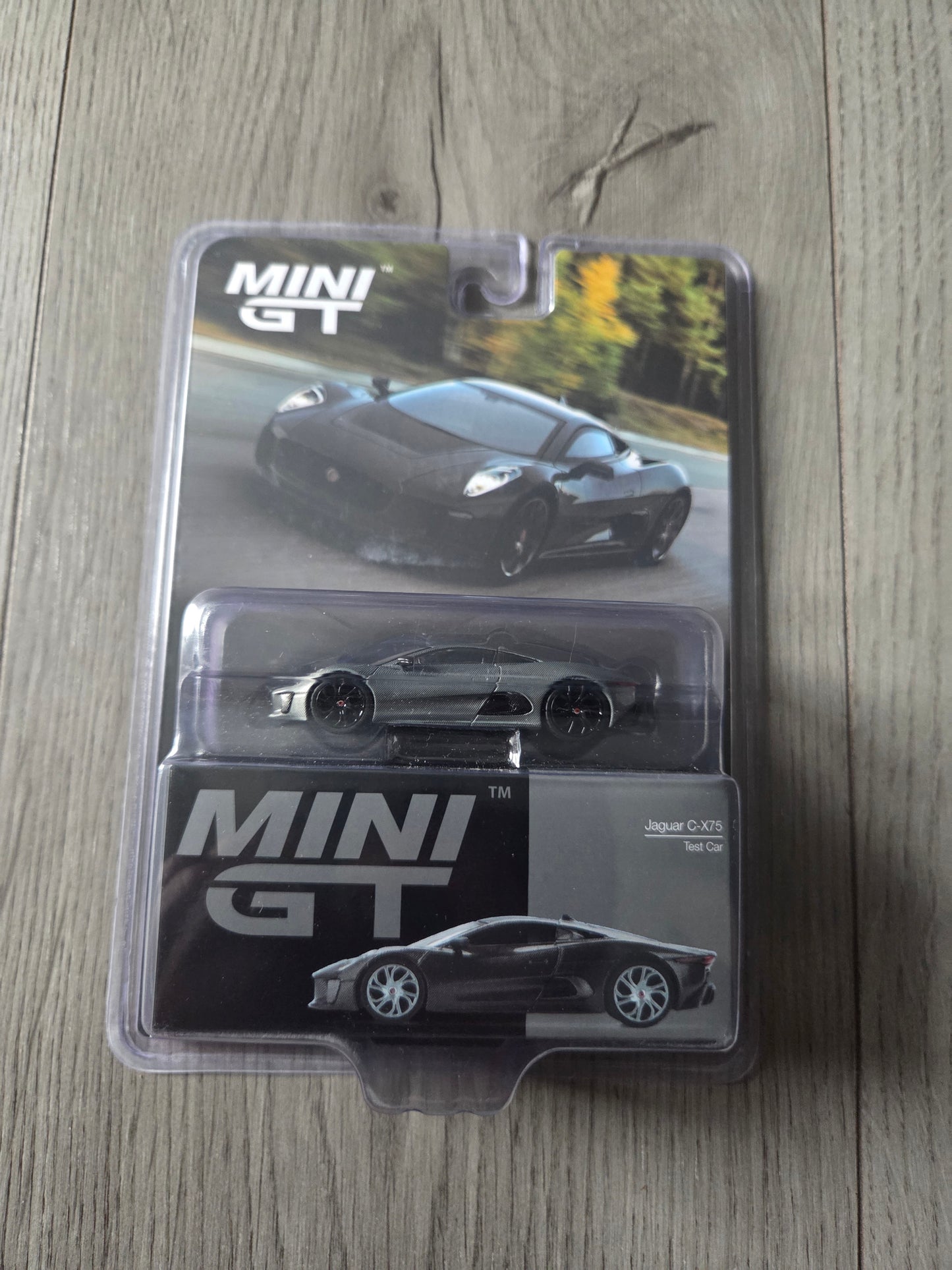 Mini Gt Jaguar cx75 Test Car Chase Blister Card #997